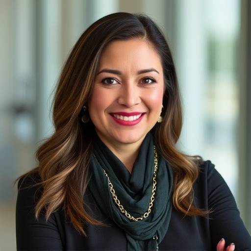 Photograph of Elena Rodriguez, General Manager of Apex Motors